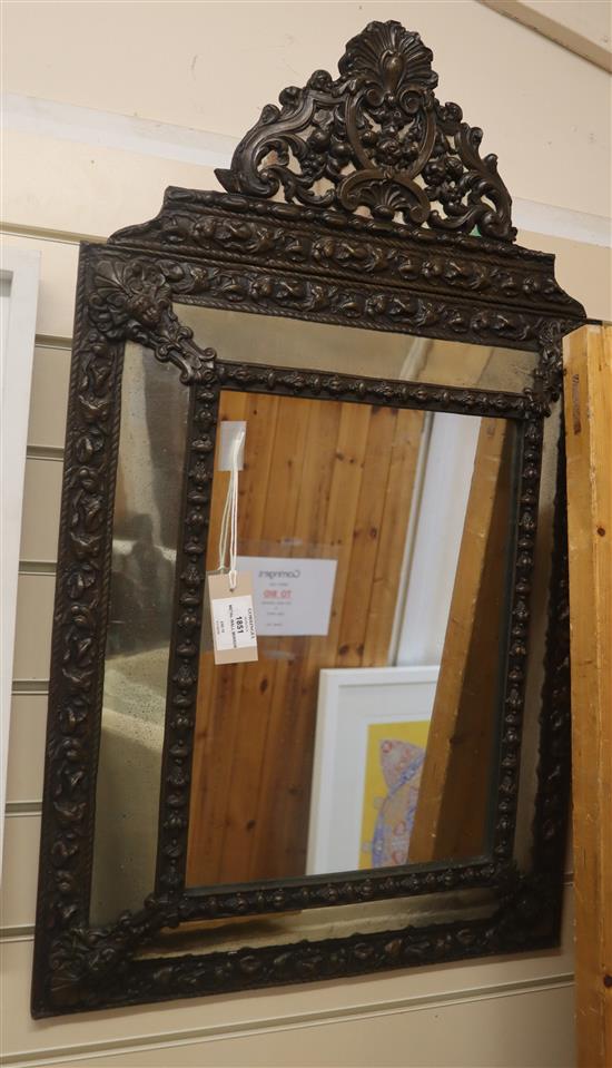 A French embossed metal wall mirror H.86cm